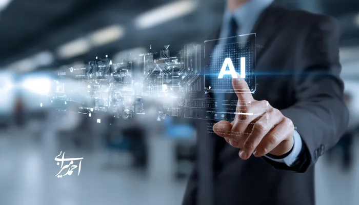مدیر تجاری با لباس رسمی در حال لمس آیکون هوش مصنوعی (AI) روی صفحهی شفاف دیجیتال در محیط اداری مدرن، نماد تحول کسبوکار با فناوری هوش مصنوعی — دکتر احمد میرابی