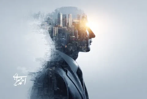 چهره مردی در کت رسمی با تصویر محو شده از ساختمان‌های شهری در ذهن او؛ نمادی از رهبری، تفکر راهبردی و آینده‌نگری در کسب‌وکار