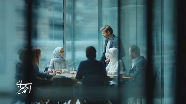 executive coaching helping an Iranian manager build a stronger, high-performance team through collaborative discussion in a modern office